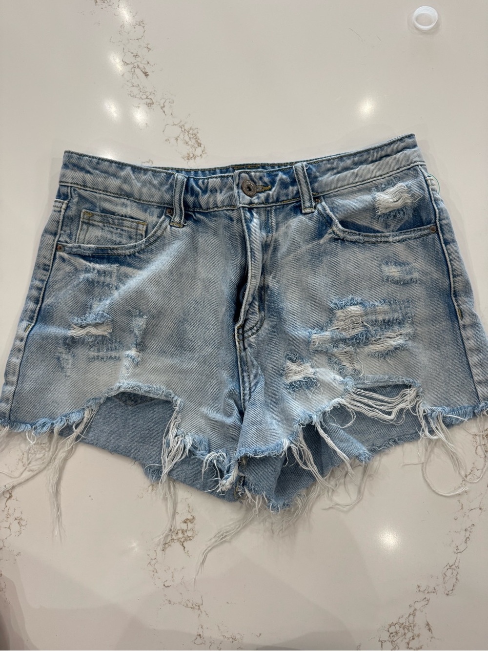 Women’s Light Blue Distressed Denim Cutoff Shorts